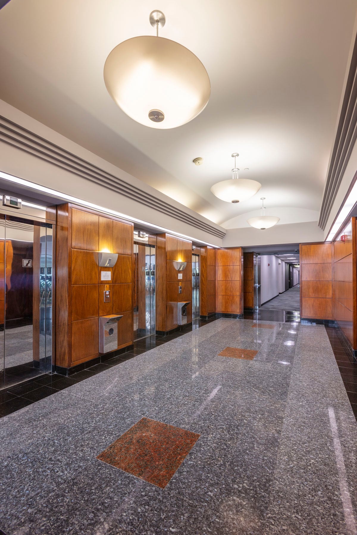 Elevator lobby with polished granite floors